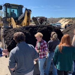 students studying compost